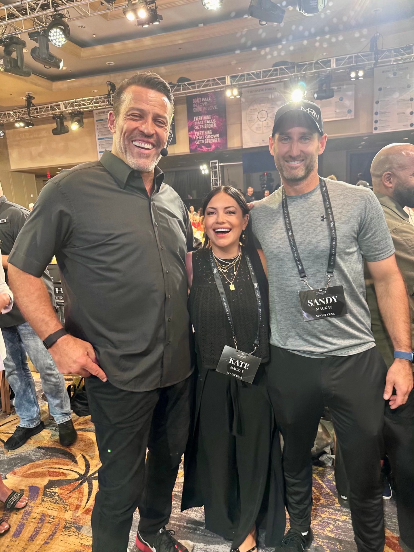 Sandy MacKay and Kate MacKay with Tony Robbins